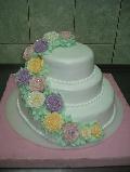 Svadbena torta sa šarenim cvećem